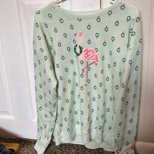 Small sweater with flamingo on it